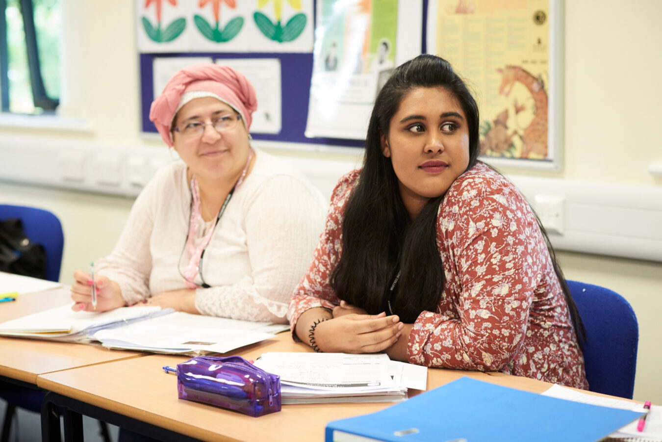 2 adult female students in classroom