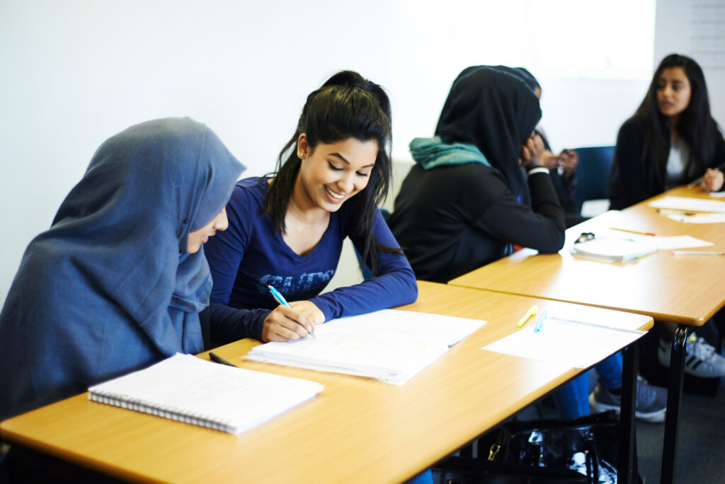 students discussing in classroom