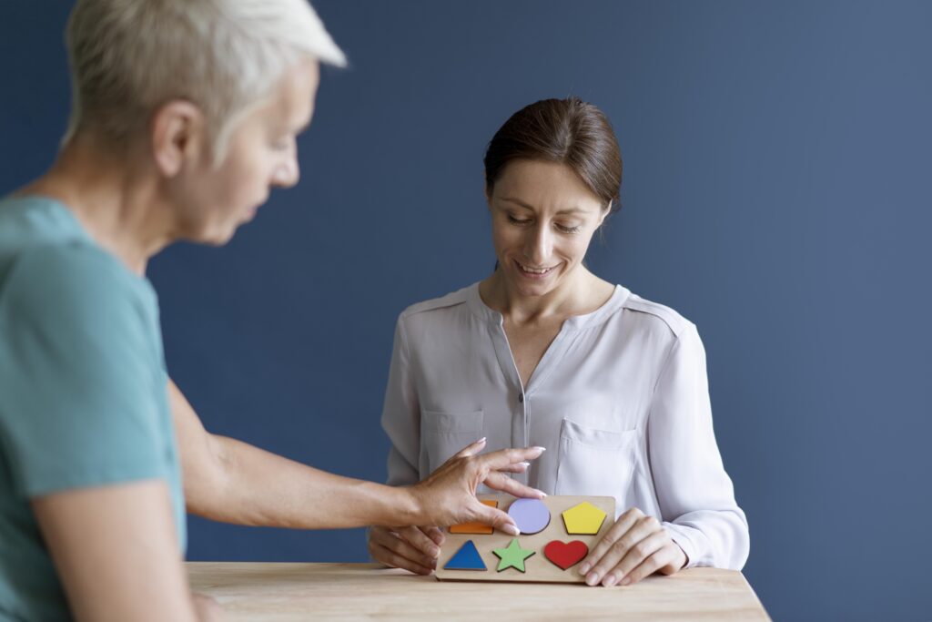 woman-doing-occupational-therapy-session-with-psychologist Women doing occupational therapy