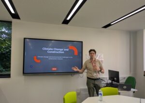 Bouygues representative giving talk on climate change and construction