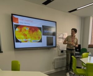 Bouygues representative giving talk on climate change and construction