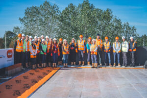 Group Team and Guests at building rooftop