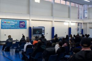 Stanmore College students watch onscreen talk by ITV Academy.