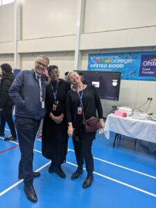 Staff at College Charity fundraiser event.