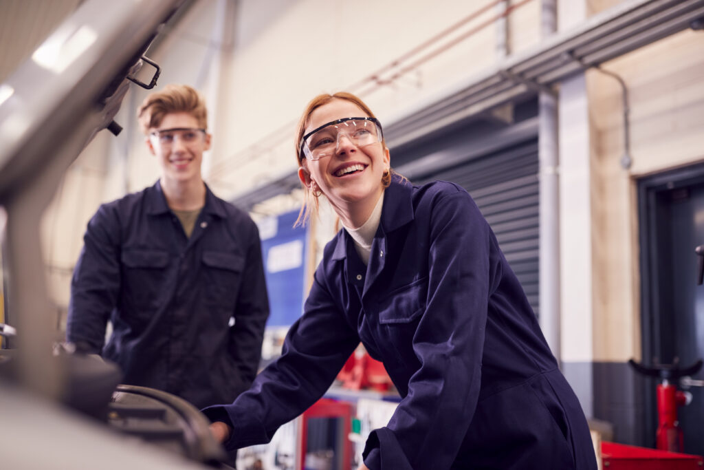 Stanmore College - Male And Female Students Looking At Car Engine On Auto Mechanic Apprenticeship Course At College