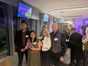 Student with her family at award ceremony