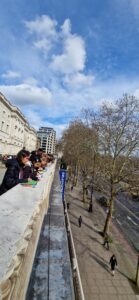 Students standing at Embankment bridge