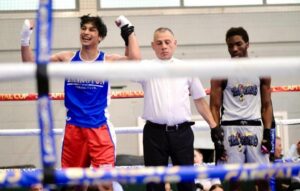 Stanmore College student winning Championship in boxing ring