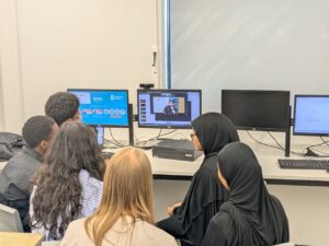 Stanmore College students watching presentation on computer