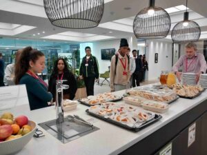 stanmore college students enjoy refreshments during acca visit in london